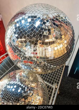 Big Retro Disco Ball in Shopping Cart Stock Photo