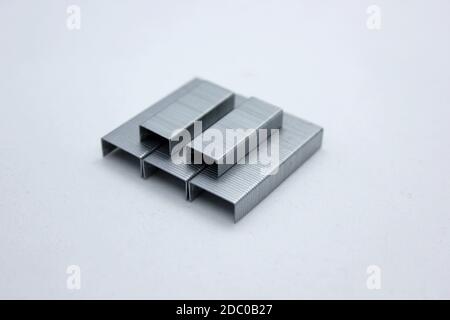 Metal staples for stapler isolated on white background Stock Photo