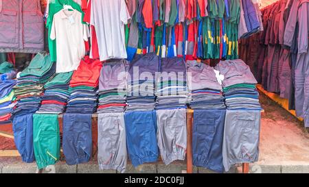 Huge Selection of Work Clothing Pants Gear Stock Photo