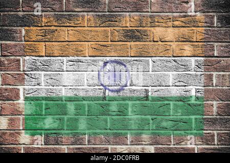 An India flag painted on brick wall background Stock Photo