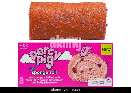 M&S Percy Pig sponge roll cake out of box set on white background - pink sponge roll filled with Percy Pig flavour buttercream and fluffy jelly pieces Stock Photo