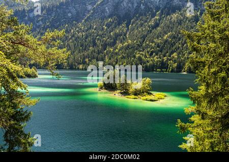 view on beautiful island in the eibsee in front of the zugspitze mountain, bavaria, germany Stock Photo