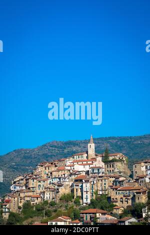 APRICALE, ITALY - CIRCA AUGUST 2020: traditional old village made of stones located in Italian Liguria region  with blue sky and copyspace Stock Photo