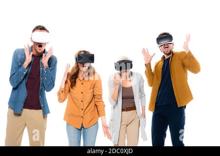 Excited friends using vr headsets isolated on white Stock Photo