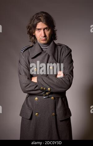 young man dressed as russian military, studio picture Stock Photo