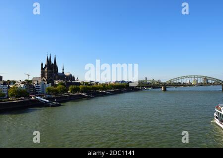 Cologne Cathedral and Hohenzollern Bridge in Cologne, Germany Stock Photo