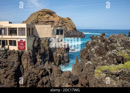 Porto Moniz, Madeira, Portugal - April 18, 2018: Natural rock pool of Porto Moniz on Madeira Island. Portugal.  It is a public bath with water from th Stock Photo