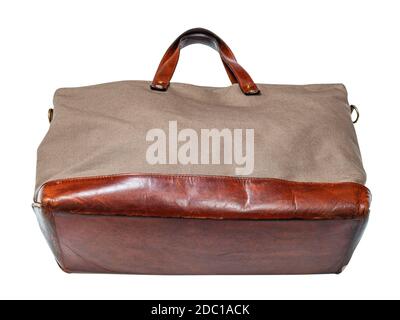 bottom view of handcrafted travel handbag made from leather and canvas tarp isolated on white background Stock Photo