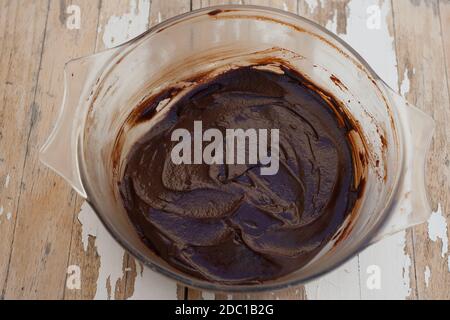 Dark chocolate sauce used from chocolate truffles in a bowl Stock Photo