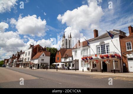 Picturesque Tenterden High Street with a flower bedecked Town Hall, Kent, UK Stock Photo