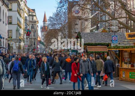 View of Christmas Market on Kaufingerstrasse and Old Town Hall in background, Munich, Bavaria, Germany, Europe Stock Photo