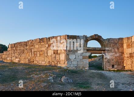 Hierapolis ancient city Pamukkale Turkey, young woman with hat watching ...