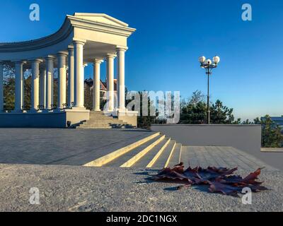 Photo of Chernomorsk, Ukraine 2020. Colonnade in Chernomorsk city on a sunny autumn morning. Stock Photo