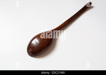 Wooden spoon isolated on a white background Stock Photo