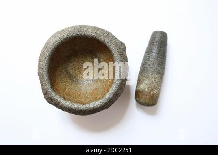 Traditional Stone Mortar And Pestle Set On White Background Stock Photo