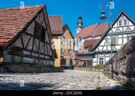 Old historical buildings and a road made of paving stones Stock Photo