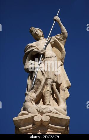 BJELOVAR, CROATIA - SEPTEMBER 06: Saint George statue in front of the Cathedral of St. Teresa of Avila in Bjelovar, Croatia on September 06, 2013 Stock Photo