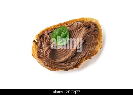 Slice of bread with chocolate paste on white Stock Photo