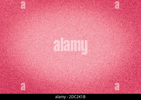 Texture of granite scarlet color with small dots, with vignetting. Stock Photo