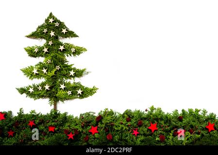 Christmas Tree With Copy Space. Christmas Tree Is Made Of Fir Branch. Christmas Decoration And Ornament With White Isolated Backround Stock Photo