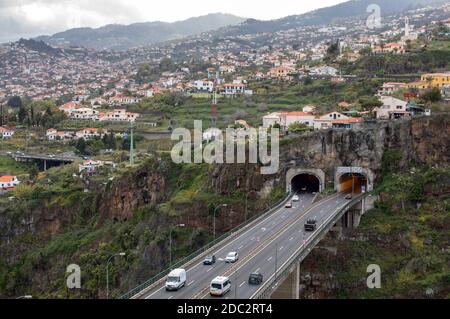 Funchal, Madeira, Portugal - April 23, 2018: Tunnel with a panorama of the city of Funchal in the background. Madeira, Portygal. Stock Photo