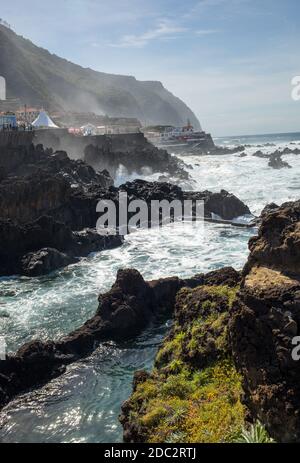 Porto Moniz, Madeira, Portugal - April 18, 2018: Natural rock pool of Porto Moniz on Madeira Island. Portugal.  It is a public bath with water from th Stock Photo