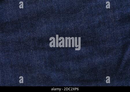 Background from dark blue jeans close up Stock Photo