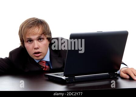 young silly man working with his personal computer Stock Photo