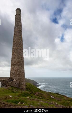 Chimney stack of the arsenic labyrinth, designed to remove toxic fumes from tin production, the abandoned Botallack Mine, West Penwith, Cornwall, UK Stock Photo