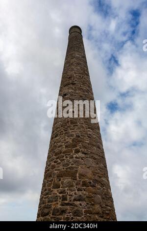 Chimney stack of the arsenic labyrinth, designed to remove toxic fumes from tin production, the abandoned Botallack Mine, West Penwith, Cornwall, UK Stock Photo