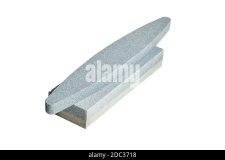 Two Sharpening stones. Grindstone or whetstone sharpener, isolated on white background. Kitchen utensils Stock Photo