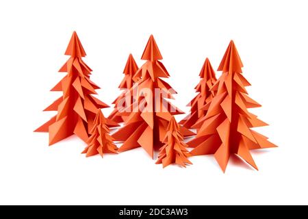 Paper Christmas trees, red fir trees isolated on white background Stock Photo