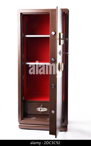 Huge self standing safe box on white background. The door is opened and interior is empty. Stock Photo