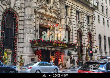 The Peninsula Hotel. A Historic and Luxury Hotel in the Heart of Manhattan with Impressive Christmas Decoration. Two Reindeers Above the Entrance Stock Photo