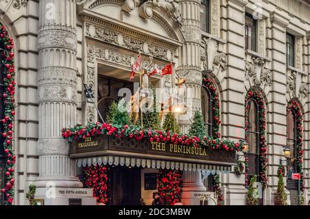 The Peninsula Hotel. A Historic and Luxury Hotel in the Heart of Manhattan with Impressive Christmas Decoration. Two Reindeers Above the Entrance Stock Photo