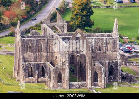 Looking down on Tintern Abbey in the Wye Valley from the Devil's Pulpit on Shorn Cliff, Tidenham Chase, Gloucestershire UK Stock Photo