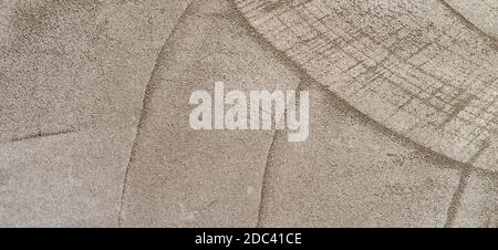 Abstract geometric plaster wall background. Gray concrete wall texture as banner background Stock Photo