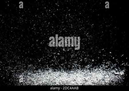 Snowflakes particles isolated on black background. Abstract template for design Stock Photo