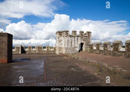 The roof and corner tower with castellated walls at the top of the Great Tower of Dover Castle, Dover, Kent. UK. On the sunny summer day with blue sky and sunshine. (121) Stock Photo
