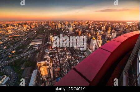 Wide Angle Skyscraper View of Bangkok, Thailand. Cityscape in Evening Golden Light at Sunset. Stock Photo