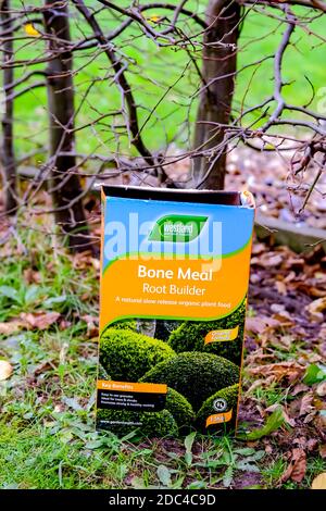 Norwich, Norfolk, UK – November 17 2020. An illustrative photo of a box of Westland bonemeal root builder in a rural garden Stock Photo