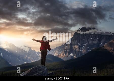 Girl enjoying the beautiful scenery of the Canadian Rockies Stock Photo
