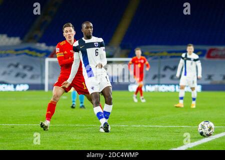 Cardiff, Wales, UK. 18th Nov, 2020. Glen Kamara of Finland pressured by Harry Wilson of Wales during the UEFA Nations League match between Wales and Finland at Cardiff City Stadium. Credit: Mark Hawkins/Alamy Live News Stock Photo