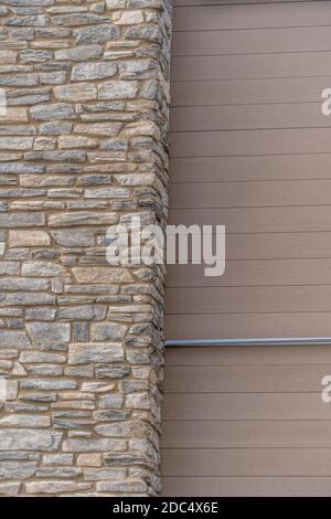 Horizontal decorative stone veneer applied on a wall Stock Photo