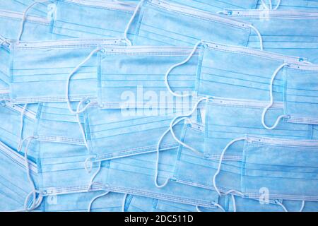 Blue three ply surgical mask on white Stock Photo