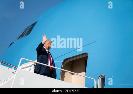 US President Donald Trump boards Air Force One on October 14, 2020 at Joint Base Andrews in Maryland. Trump is scheduled to fly to Des Moines, Iowa for a Make America Great campaign rally before returning to the White House tonight. Credit: Alex Edelman/The Photo Access