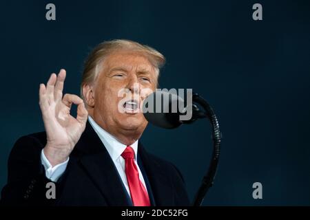 US President Donald Trump speaks during a Make America Great Again campaign event at Des Moines International Airport on October 14, 2020 in Des Moines, Iowa. Trump campaigns a week after recovering from COVID-19. Credit: Alex Edelman/The Photo Access