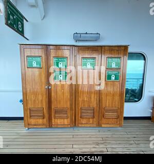 The lifejacket locker on a cruise ship where lifejackets are available in case of an emergency. Stock Photo