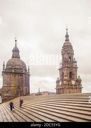 People walking on roof of Cathedral in Santiago de Compostela, Galicia, Spain with copy space Stock Photo