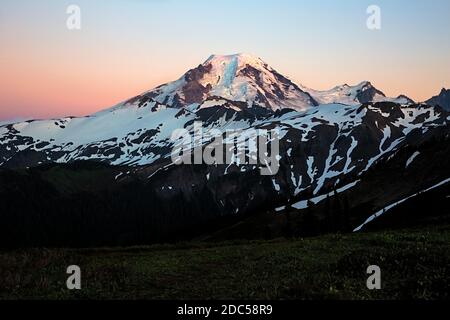 WA18212-00...WASHINGTON - A quiet sunset on Mount Baker from Skyline Divide in the Mount Baker Wilderness area. Stock Photo
